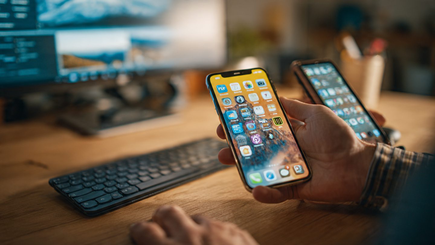 person-using-both-an-iphone-and-an-android-phone-f